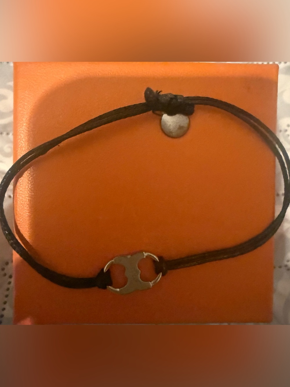 Tory Burch Black Cord Bracelet with Silver Logo Charm